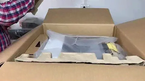 Unboxing the Kyocera P2235DN laser printer.